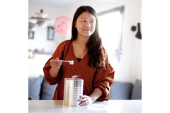 Image Asian woman making protein shake.